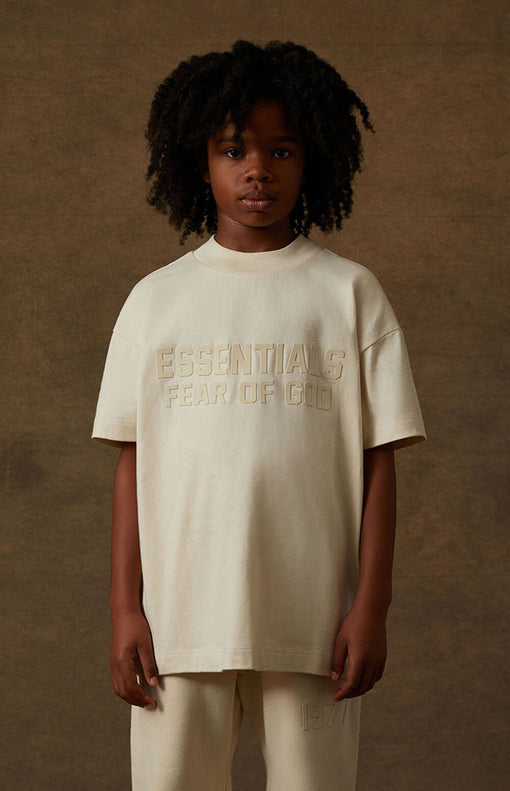 Camiseta Fear of God - Essentials "Kids" Creme