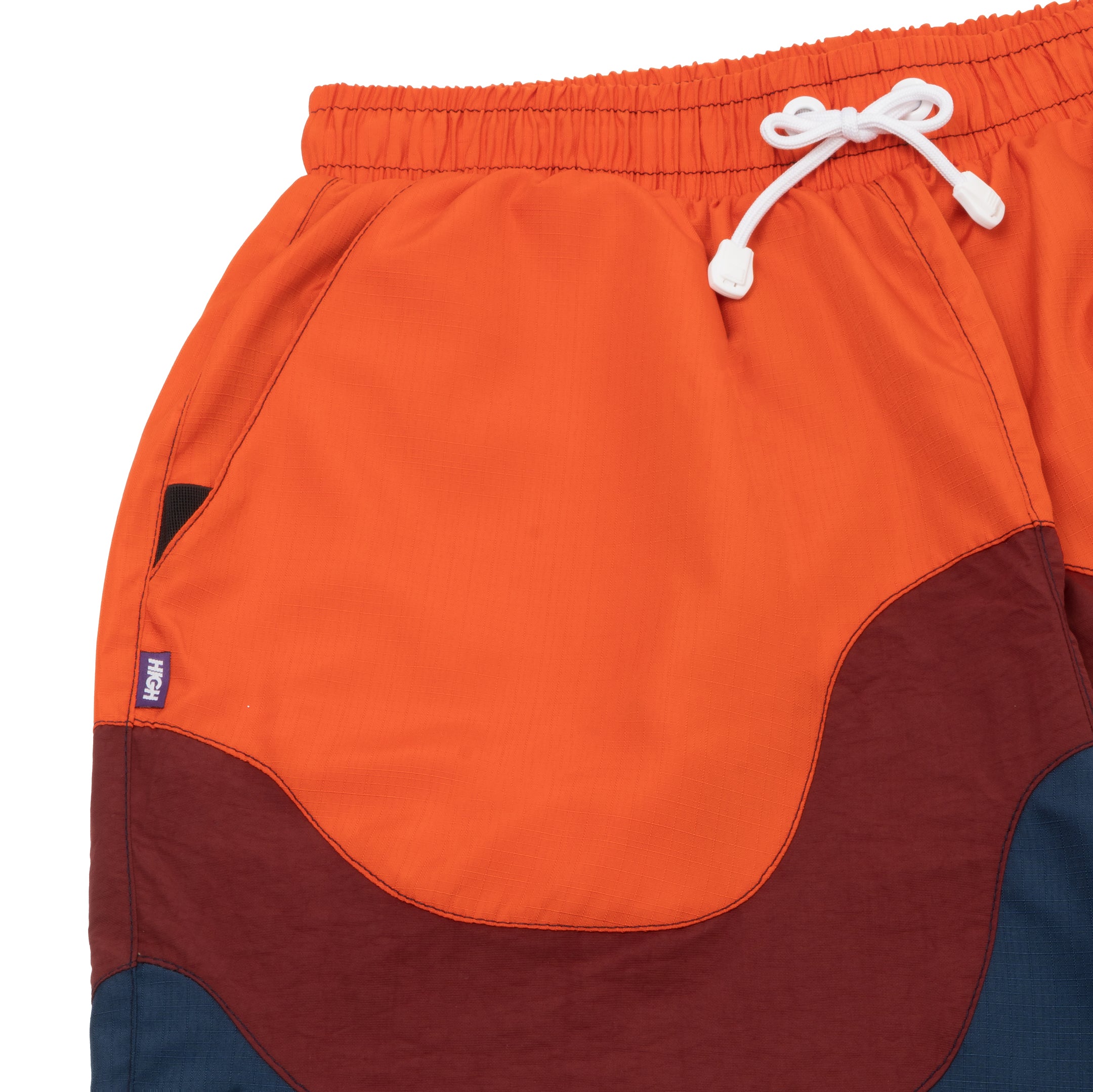 Shorts High Layered Laranja – COP CLUB